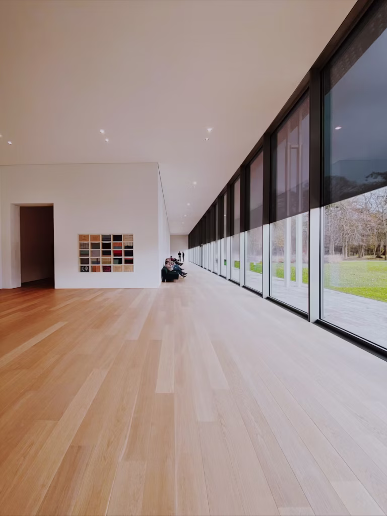 Home office featuring solar shades on window
